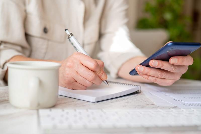 Woman deciding down payment amount on home loan.