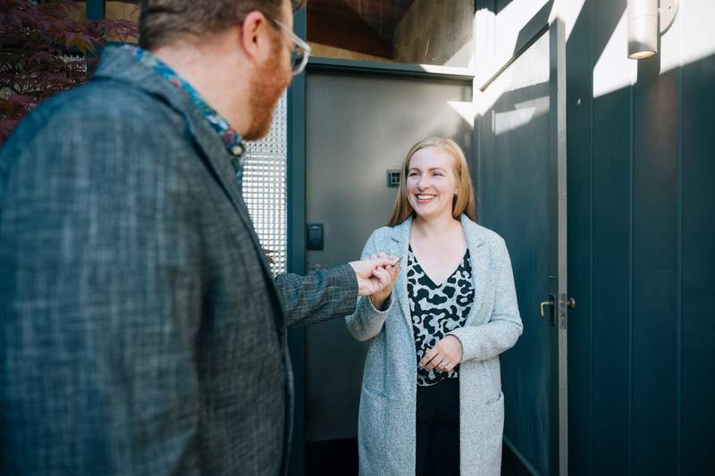 woman buys her first home