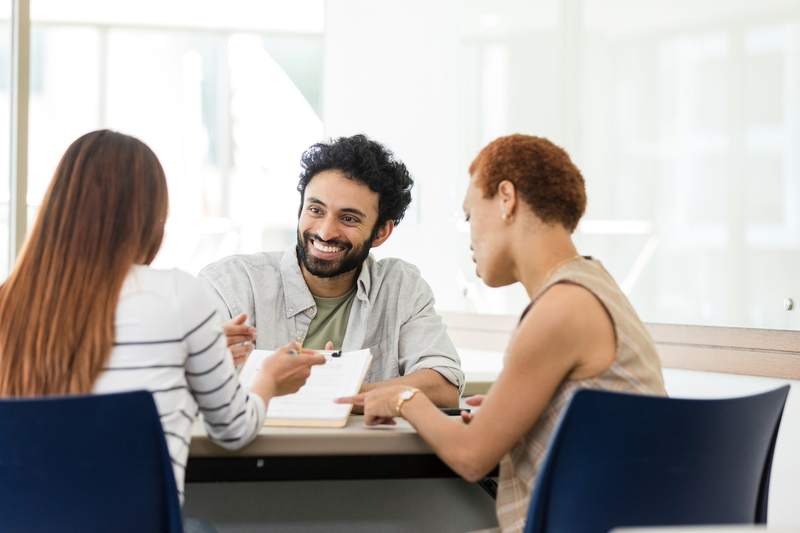 woman refinances mortgage